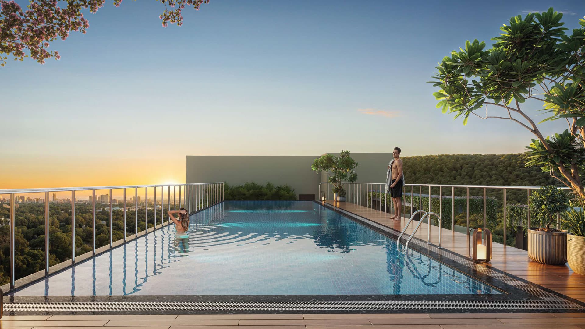 Rooftop swimming pool overlooking the city at sunset