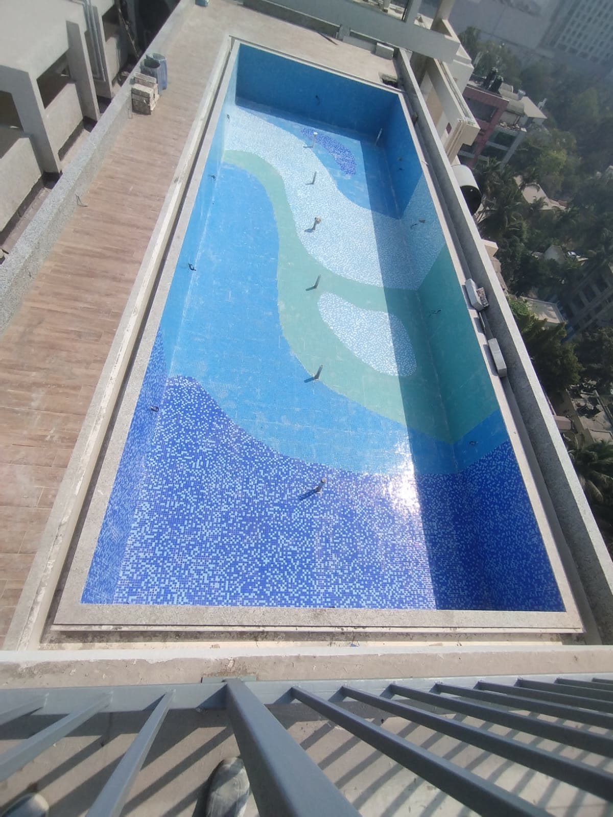 Site photograph of the completed rooftop pool shell